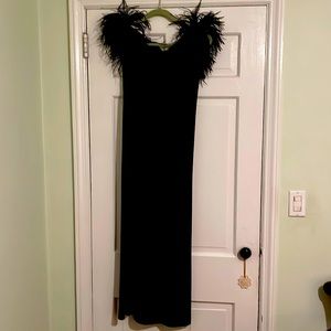 Black velvet fitted dress with boa neckline